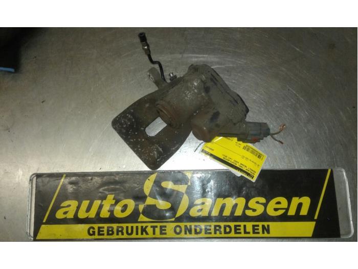 Rear brake calliper, right from a Renault Grand Scénic III (JZ) 1.5 dCi 110 2013