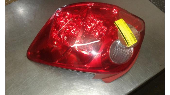 Taillight, left from a Toyota Auris (E15) 1.4 D-4D-F 16V 2008