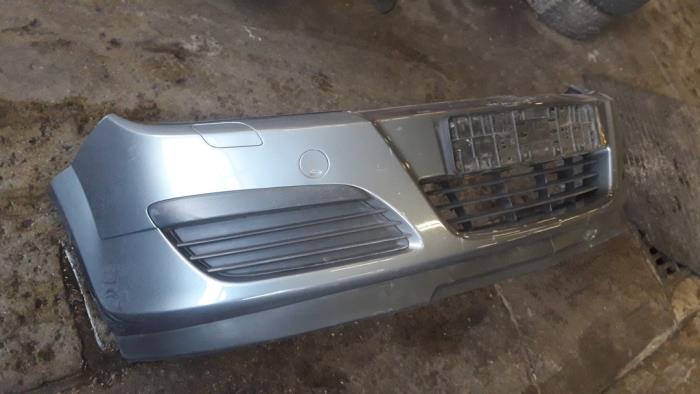 Front bumper from a Opel Astra H SW (L35) 1.6 16V Twinport 2006