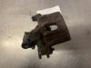 Rear brake calliper, left from a Ford Focus 3 Wagon 1.6 Ti-VCT 16V 105 2011