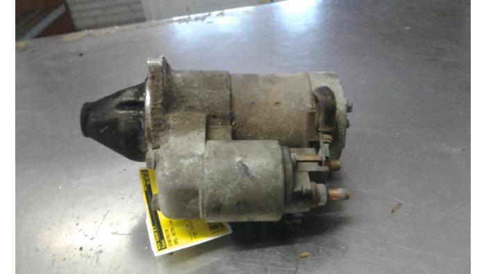Starter from a Opel Astra H GTC (L08) 1.8 16V 2006