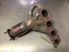 Exhaust manifold + catalyst from a Seat Ibiza IV SC (6J1) 1.4 16V 2010
