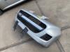Front bumper from a Peugeot 107 1.0 12V 2011