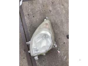 Used Headlight, left Daihatsu Cuore (L251/271/276) 1.0 12V DVVT Price € 50,00 Margin scheme offered by Auto Samsen B.V.