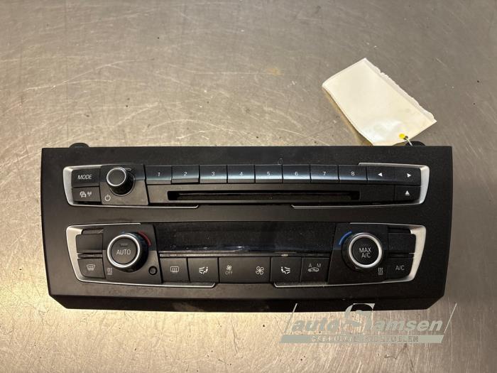 Używane Panel climatronic BMW 1 serie (F20) 116d 1.6 16V Efficient Dynamics Cena € 125,00 Procedura marży oferowane przez Auto Samsen B.V.