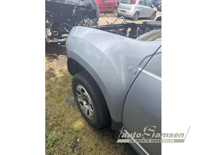Używane Ekran lewy przód Dacia Duster (HS) 1.6 16V Cena € 150,00 Procedura marży oferowane przez Auto Samsen B.V.