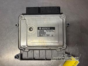Engine management computer from a Kia Rio II (DE) 1.4 16V 2011