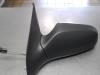Wing mirror, left from a Opel Astra H SW (L35) 1.7 CDTi 16V 2005
