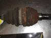 Front drive shaft, left from a Opel Zafira (F75) 2.2 16V 2003