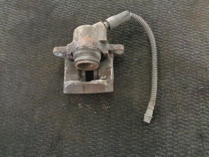 Front brake calliper, right from a Renault Twingo II (CN) 1.2 2009
