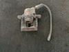 Front brake calliper, right from a Renault Twingo II (CN) 1.2 2009