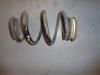 Rear coil spring from a Renault Twingo II (CN) 1.5 dCi 75 FAP 2012