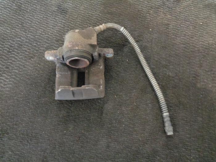 Front brake calliper, right from a Renault Twingo II (CN) 1.2 16V 2011