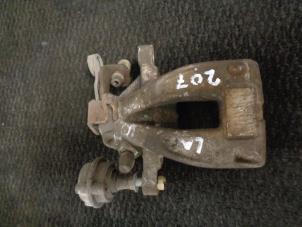Used Rear brake calliper, left Peugeot 207/207+ (WA/WC/WM) 1.6 16V VTi Price € 25,00 Margin scheme offered by Westerhof autodemontage