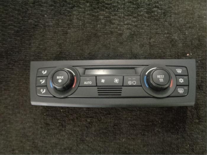 Heater control panel from a BMW 1 serie (E87/87N) 118i 16V 2005
