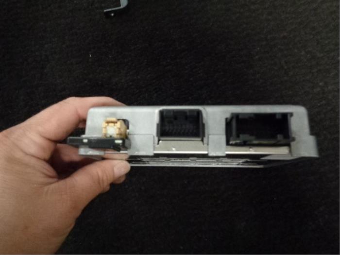 Bluetooth module from a Opel Astra J GTC (PD2/PF2) 2.0 CDTI 16V ecoFLEX 2011