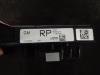 Fuse box from a Opel Astra J GTC (PD2/PF2) 2.0 CDTI 16V ecoFLEX 2011