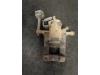 Rear brake calliper, left from a Opel Astra J GTC (PD2/PF2) 2.0 CDTI 16V ecoFLEX 2011