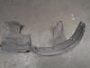 Wheel arch liner from a Renault Twingo II (CN) 1.2 16V 2010