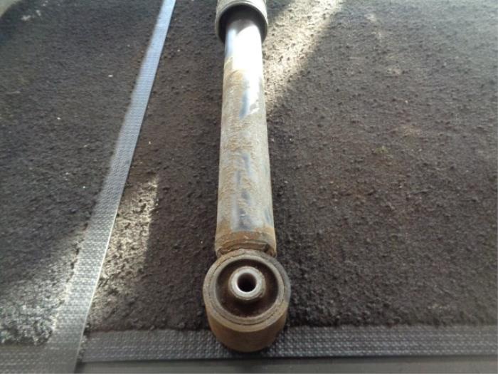 Rear shock absorber, left from a Volkswagen Lupo (6X1)  2000