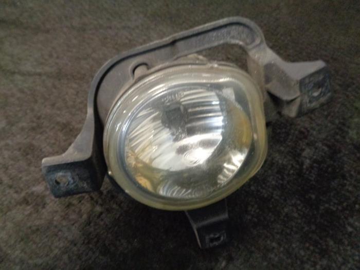 Fog light, front left from a Ford Ka II 1.2 2010