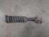 Fronts shock absorber, left from a Suzuki Wagon R+ 2007