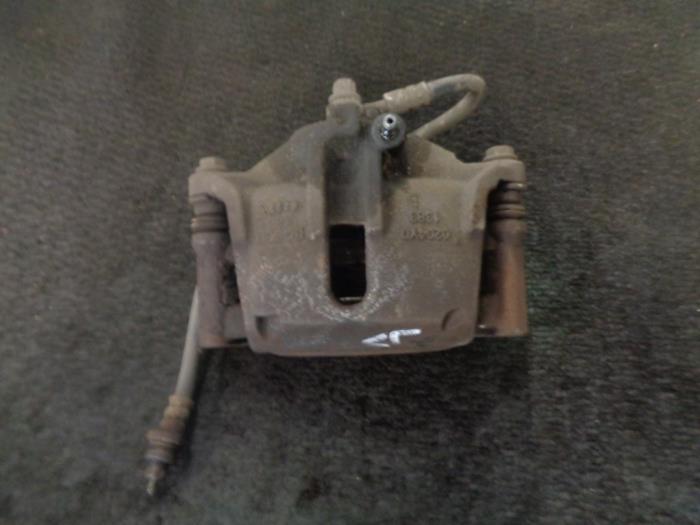 Front brake calliper, left from a Suzuki Wagon R+ 2007