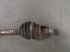 Front drive shaft, left from a Seat Ibiza IV (6J5) 1.4 16V 2008