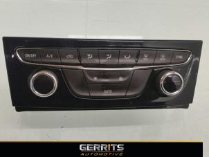 Usados Panel de control de calefacción Opel Astra K 1.4 Turbo 16V Precio € 82,48 Norma de margen ofrecido por Gerrits Automotive
