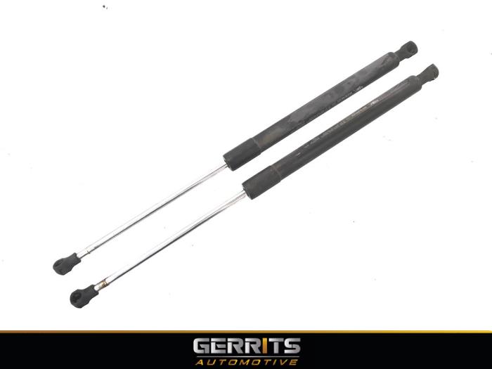 Set of gas struts for boot from a Renault Clio III (BR/CR) 1.2 16V 75 2008