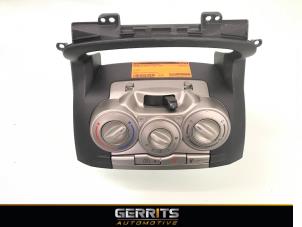Używane Panel sterowania nagrzewnicy Daihatsu Sirion 2 (M3) 1.0 12V DVVT Cena € 19,99 Procedura marży oferowane przez Gerrits Automotive