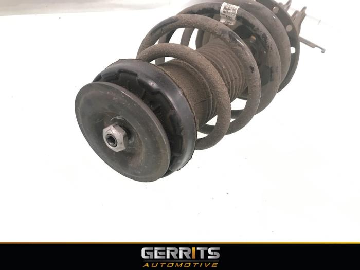 Front shock absorber rod, left from a Opel Insignia Sports Tourer 2.0 CDTI 16V 130 ecoFLEX 2009
