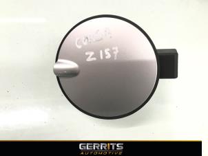 Usados Tapa de depósito Opel Corsa D 1.3 CDTi 16V ecoFLEX Precio € 19,99 Norma de margen ofrecido por Gerrits Automotive