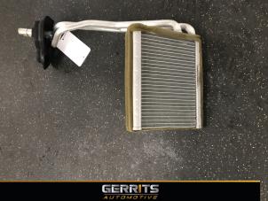 Used Heating radiator Ford B-Max (JK8) 1.0 EcoBoost 12V 100 Price € 39,60 Margin scheme offered by Gerrits Automotive