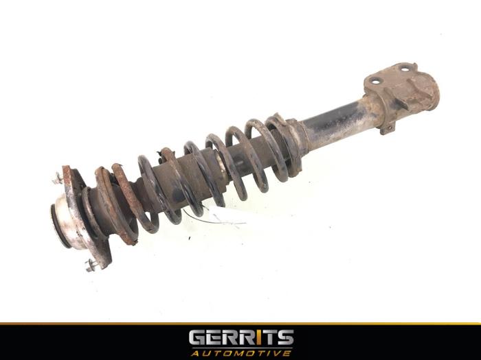 Front shock absorber rod, left from a Suzuki Wagon-R+ (RB) 1.0 12V 2007