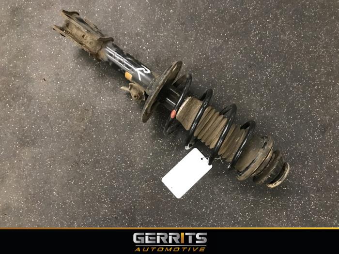 Front shock absorber rod, right from a Toyota Yaris II (P9) 1.33 16V Dual VVT-I 2011