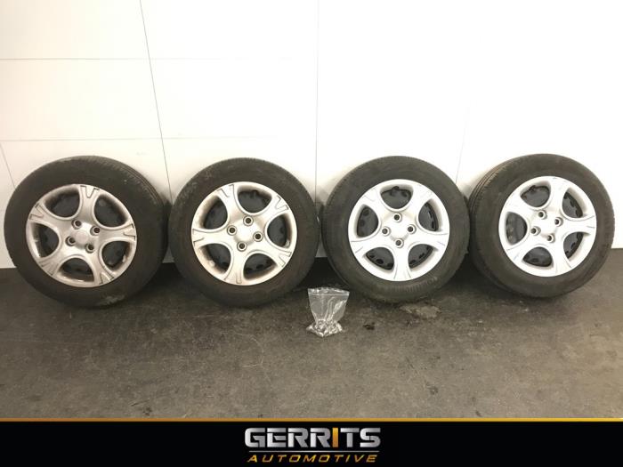 Set of wheels + tyres from a Kia Picanto (JA) 1.0 DPi 12V 2020