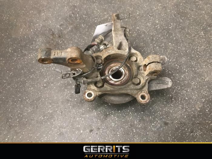 Knuckle, front right from a Kia Carens IV (RP) 1.6 GDI 16V 2016