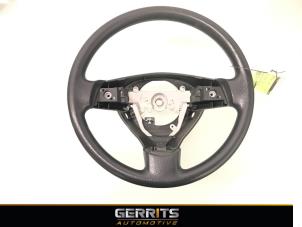 Used Steering wheel Daihatsu Cuore (L251/271/276) 1.0 12V DVVT Price € 27,48 Margin scheme offered by Gerrits Automotive
