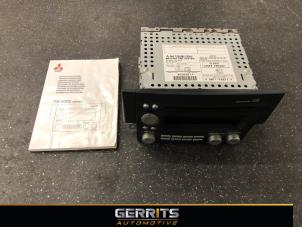 Used Navigation system Mitsubishi Colt (Z2/Z3) 1.3 16V Price € 137,48 Margin scheme offered by Gerrits Automotive