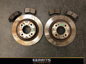 Used Brake disc + block front Mitsubishi Space Star (A0) 1.2 12V Price € 54,98 Margin scheme offered by Gerrits Automotive