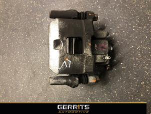 Used Front brake calliper, left Mitsubishi Space Star (A0) 1.2 12V Price € 38,48 Margin scheme offered by Gerrits Automotive