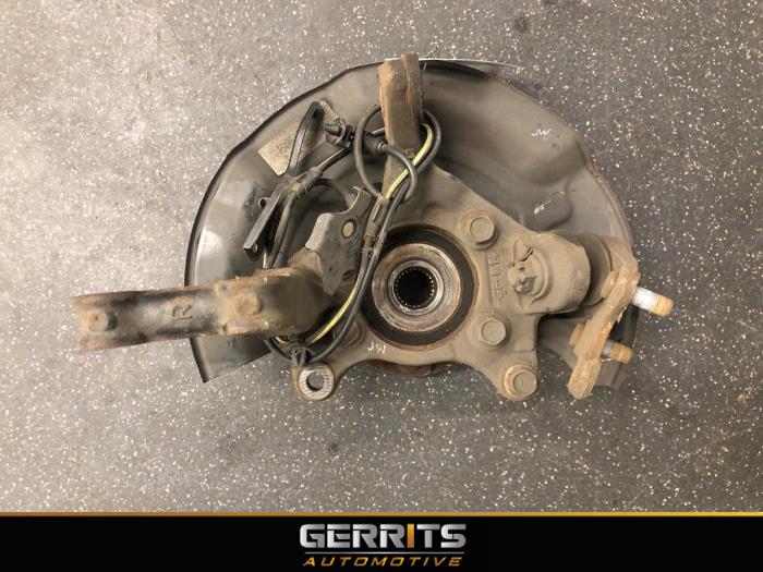 Knuckle, front right from a Toyota Auris Touring Sports (E18) 1.8 16V Hybrid 2014