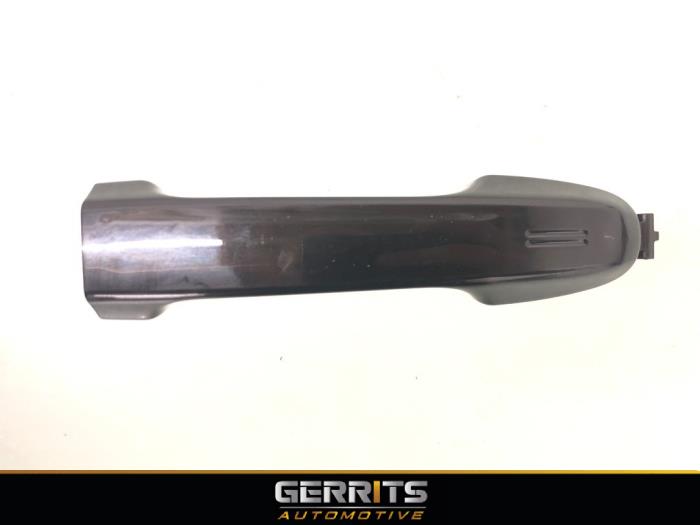 Door handle 4-door, front left from a Toyota Auris Touring Sports (E18) 1.8 16V Hybrid 2014