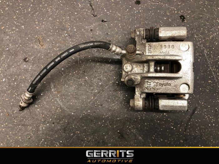 Gebrauchte Bremszange rechts hinten Toyota Corolla (E12) 1.8 16V TS VVT-i Preis € 65,98 Margenregelung angeboten von Gerrits Automotive BV