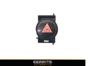 Usados Interruptor de luz de pánico Toyota Auris Touring Sports (E18) 1.8 16V Hybrid Precio € 21,98 Norma de margen ofrecido por Gerrits Automotive