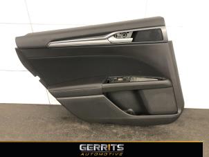Używane Tapicerka drzwi lewych tylnych wersja 4-drzwiowa Ford Mondeo V Wagon 1.5 TDCi Cena € 82,48 Procedura marży oferowane przez Gerrits Automotive