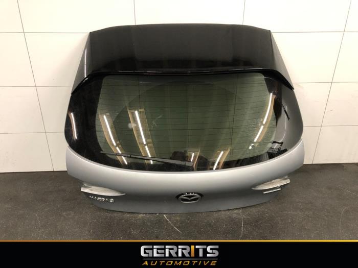 Używane Tylna klapa Mazda 3 Sport (BP) 2.0 SkyActiv-G 122 Mild Hybrid 16V Cena € 699,99 Procedura marży oferowane przez Gerrits Automotive BV