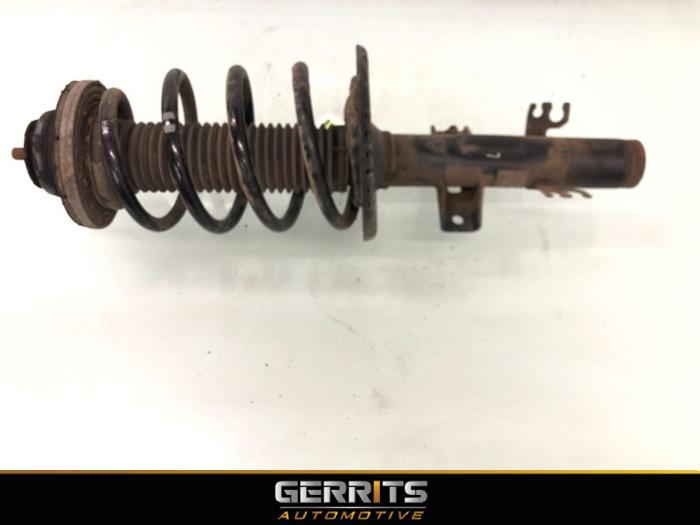 Front shock absorber rod, left from a Volkswagen Transporter T5 2.0 TDI DRF 2013