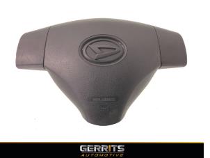 Used Left airbag (steering wheel) Daihatsu Cuore (L251/271/276) 1.0 12V DVVT Price € 82,48 Margin scheme offered by Gerrits Automotive